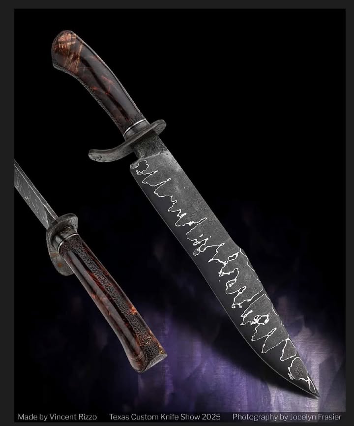 Hand-forged fixed-blade knife by Vince of Black Bird Blades, featuring a patterned steel blade with bright etched line detail and a dark wood handle; heat treated in a Jen-Ken kiln.